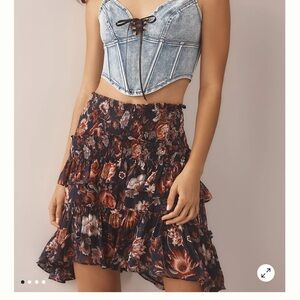 Brand new with tags! By Anthropologie Asymmetrical Smocked Mini Skirt